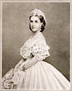 Carlota wearing light-colored dress